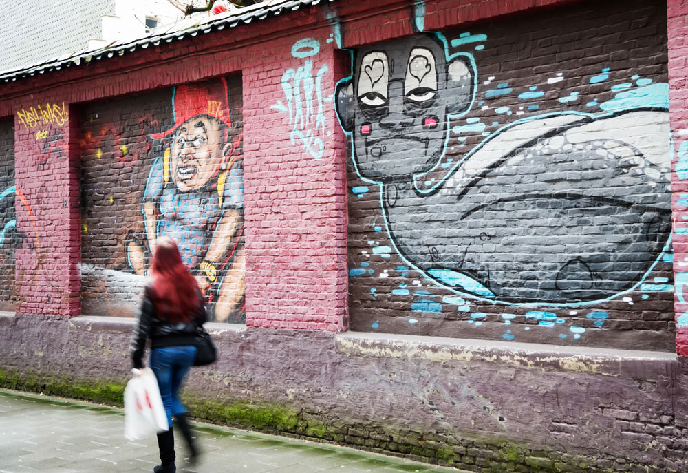 Stedentrip Gent, Belgie: de Concrete Canvas Tour langs de mooiste street art zoals in de Tweebruggenstraat.