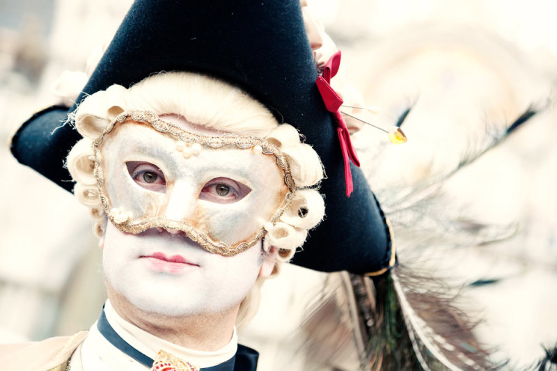 A masked man during the Carnival in Venice, Italy
