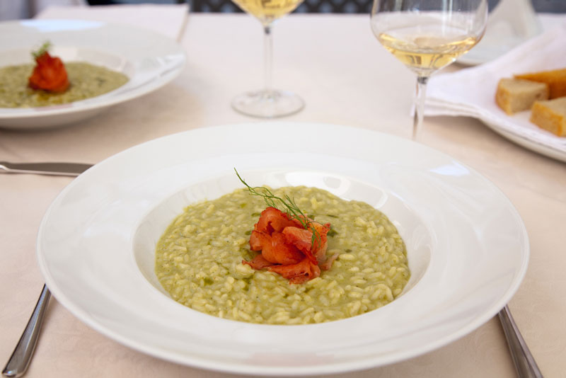 Fietsen in Italie: risotto eten in de sfeervolle stad Trento