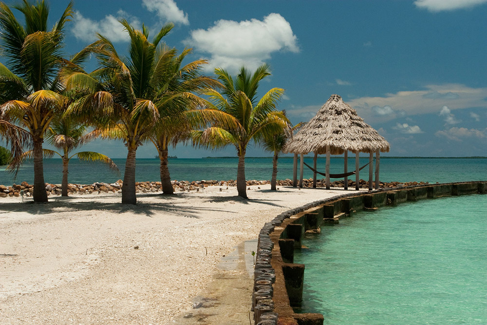Relaxen onder je eigen palmbomen inBelize