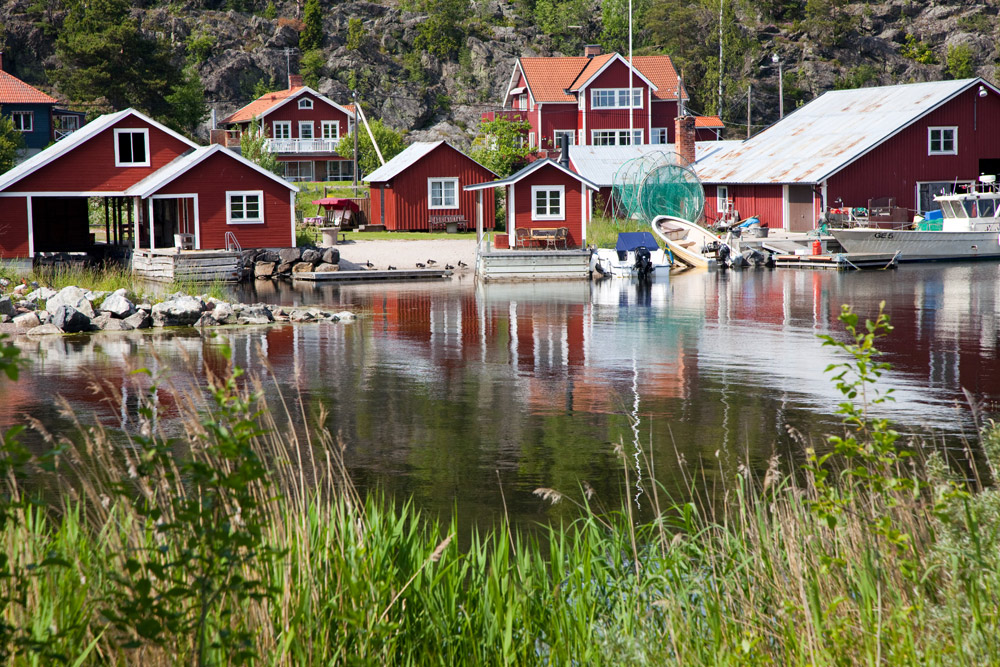 Traditioneel roodgeschilderde huizen in Bonan, Zuid-Zweden. Rondreis zuid Zweden, autorondreis