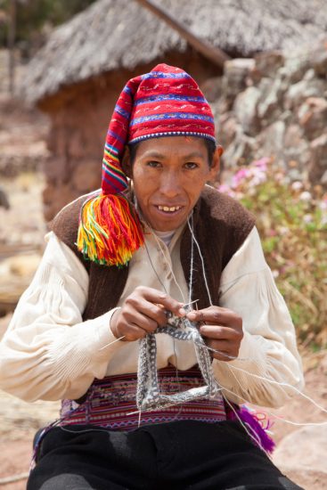 Mannen moeten kunnen breien op het Taquile-eiland in het Titicacameer, Rondreis Peru, hoogtepunten, highlights en bezienswaardigheden