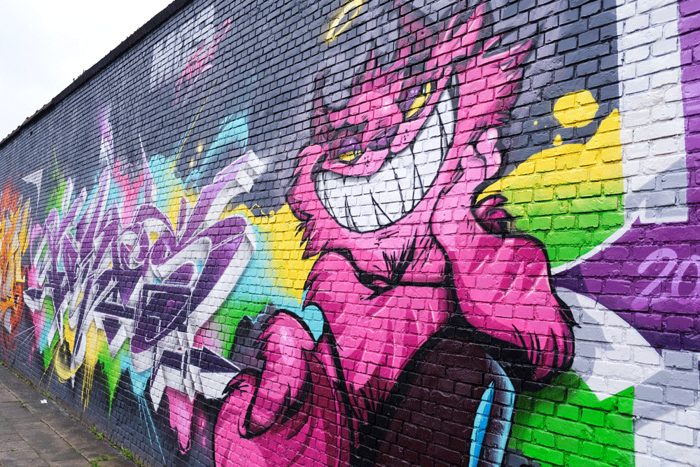 Zelfs de meest sombere dag wordt kleurrijk met street art. De Krugerstraat/Minkelersstraat vormen samen een street art walhalla. Stedentrip Antwerpen, Vlaanderen, Belgie, weekendje weg